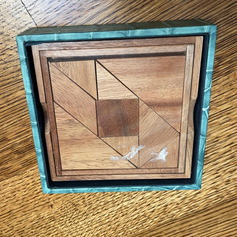 Beautiful wood puzzle in a leather case-NWOT
